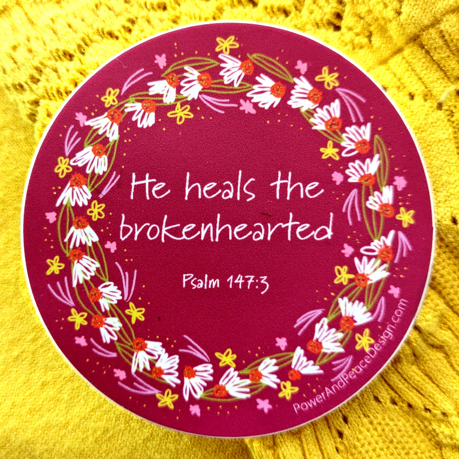Christian vinyl sticker with Psalm 147:3 He hals the brokenhearted.