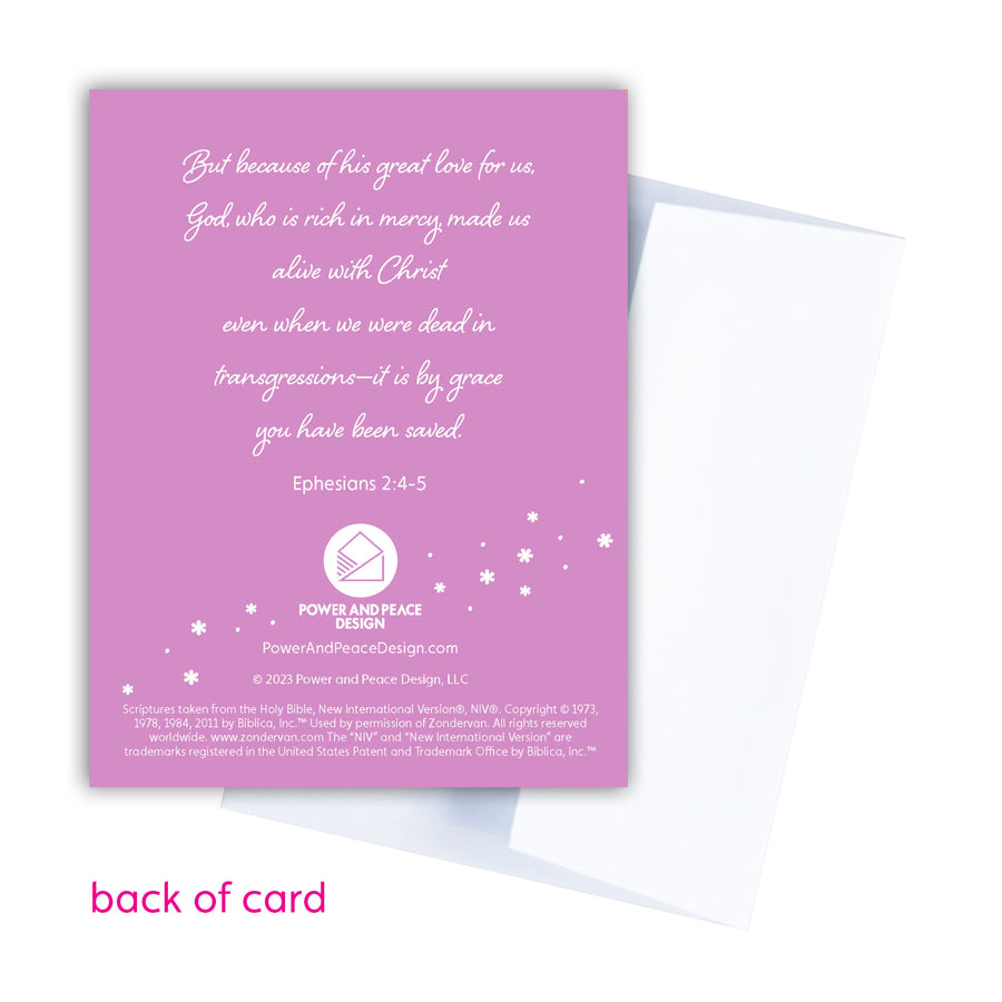 Back of baptism celebration card with Ephesians 2:4-5: But because of his great love for us, God, who is rich in mercy, made us alive with Christ even when we were dead in transgressions–it is by grace you have been saved.