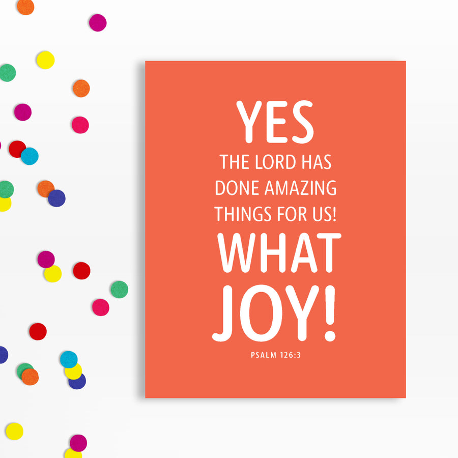 Christian joy quote greeting card. White text on coral background. Yes, the Lord has done amazing things! What joy! Psalm 126:3. Scatting of confetti on left side of image.