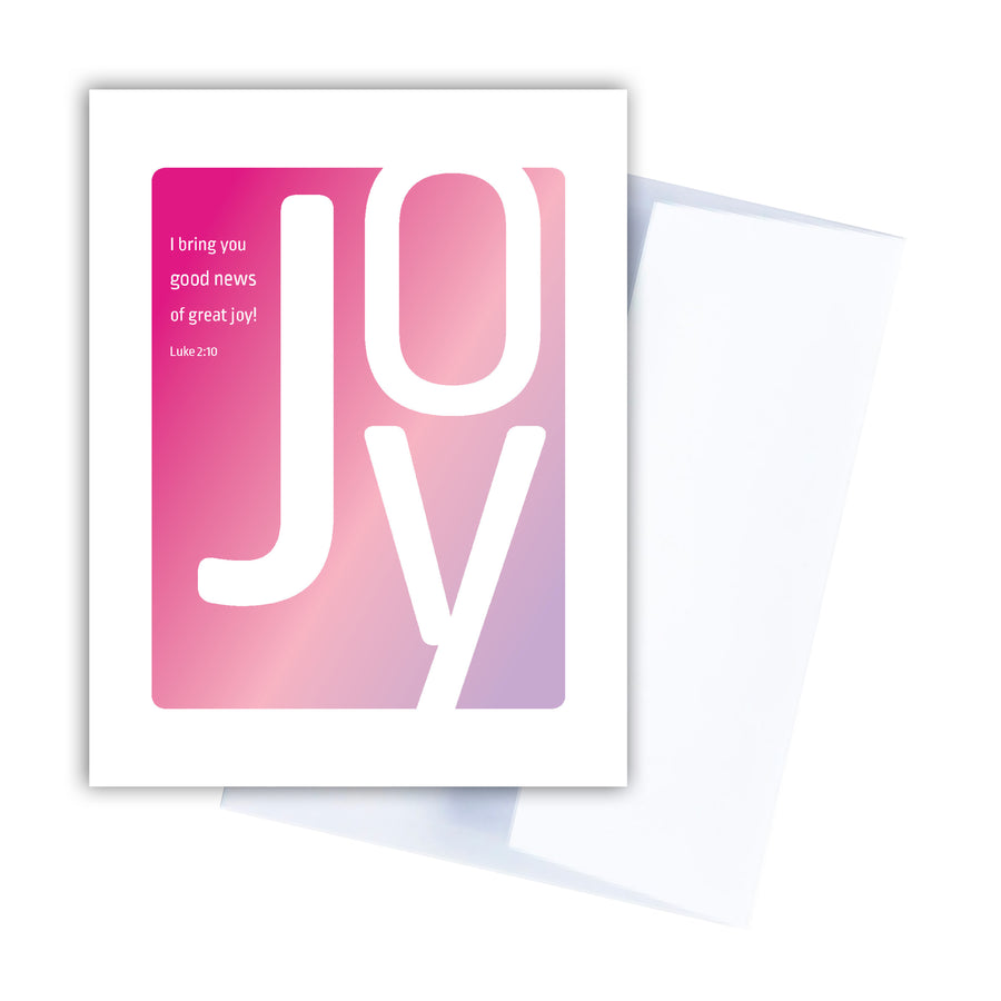 Christian adoption greeting card or Christian new baby greeting card with Luke 2:10. I bring you good news of great joy! Large white letters spelling joy shown against a pink and lavender background.