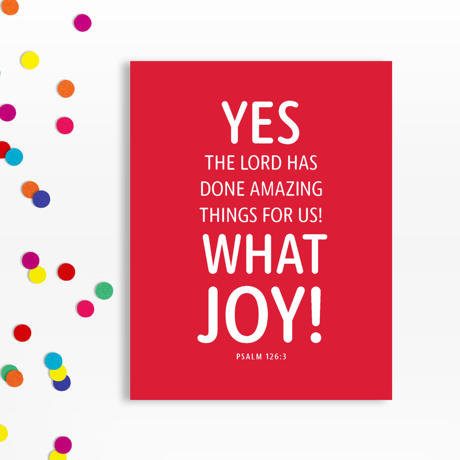 Bright red Christian birthday card with a sprinkle of confetti on the side. Card reads Yes, the Lord has done amazing things for us! What joy! Psalm 126:3.